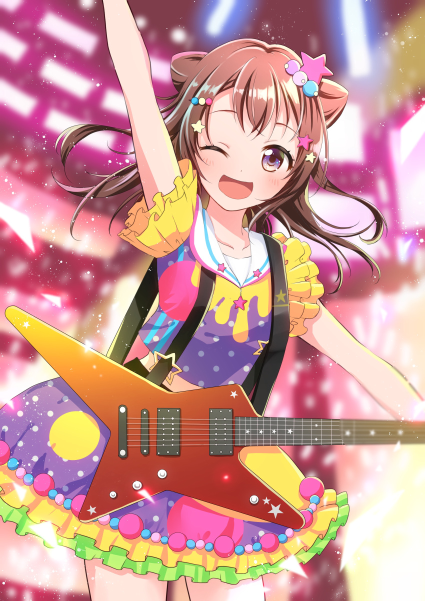 1girl ;d absurdres arm_up bang_dream! bangs blurry blurry_background brown_hair commentary_request confetti cowboy_shot electric_guitar frilled_sleeves frills guitar hair_ornament highres instrument long_hair looking_at_viewer multicolored multicolored_clothes multicolored_shirt multicolored_skirt one_eye_closed open_mouth polka_dot sailor_collar skirt smile solo star star_hair_ornament suspenders toyama_kasumi violet_eyes