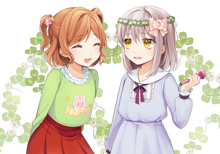 2girls :d ^_^ alternate_hairstyle animal_print arms_behind_back bang_dream! bangs black_neckwear blue_dress bow brown_hair bunny_print child closed_eyes clothes_writing clover clover_(flower) dress flower frilled_shirt_collar frilled_sleeves frills green_shirt grey_hair hair_bow hair_ornament head_wreath highres holding holding_microphone imai_lisa long_sleeves medium_hair microphone minato_yukina minori_(faddy) multiple_girls neck_ribbon open_mouth pleated_skirt print_shirt red_skirt ribbon shirt short_hair skirt smile star star_hair_ornament two_side_up yellow_eyes younger