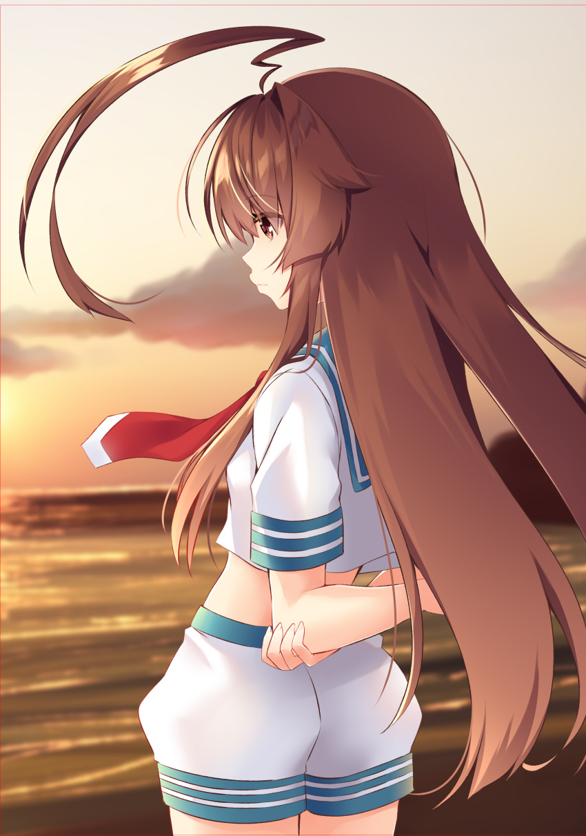 1girl absurdres ahoge arm_behind_back beach blurry blurry_background brown_eyes brown_hair commentary_request from_behind highres huge_ahoge kantai_collection ko_yu kuma_(kantai_collection) long_hair midriff neckerchief sailor_collar school_uniform serafuku short_sleeves shorts solo sunset twilight