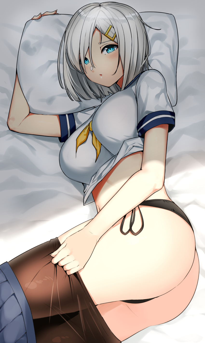 1girl absurdres ass black_panties blue_eyes blue_skirt blush breasts hair_over_one_eye hamakaze_(kantai_collection) highres kantai_collection large_breasts looking_at_viewer lying on_bed on_pillow on_side panties pantyhose pantyhose_pull pillow school_uniform serafuku short_hair short_sleeves side-tie_panties silver_hair skirt skirt_pull solo suzuharu_toufu underwear