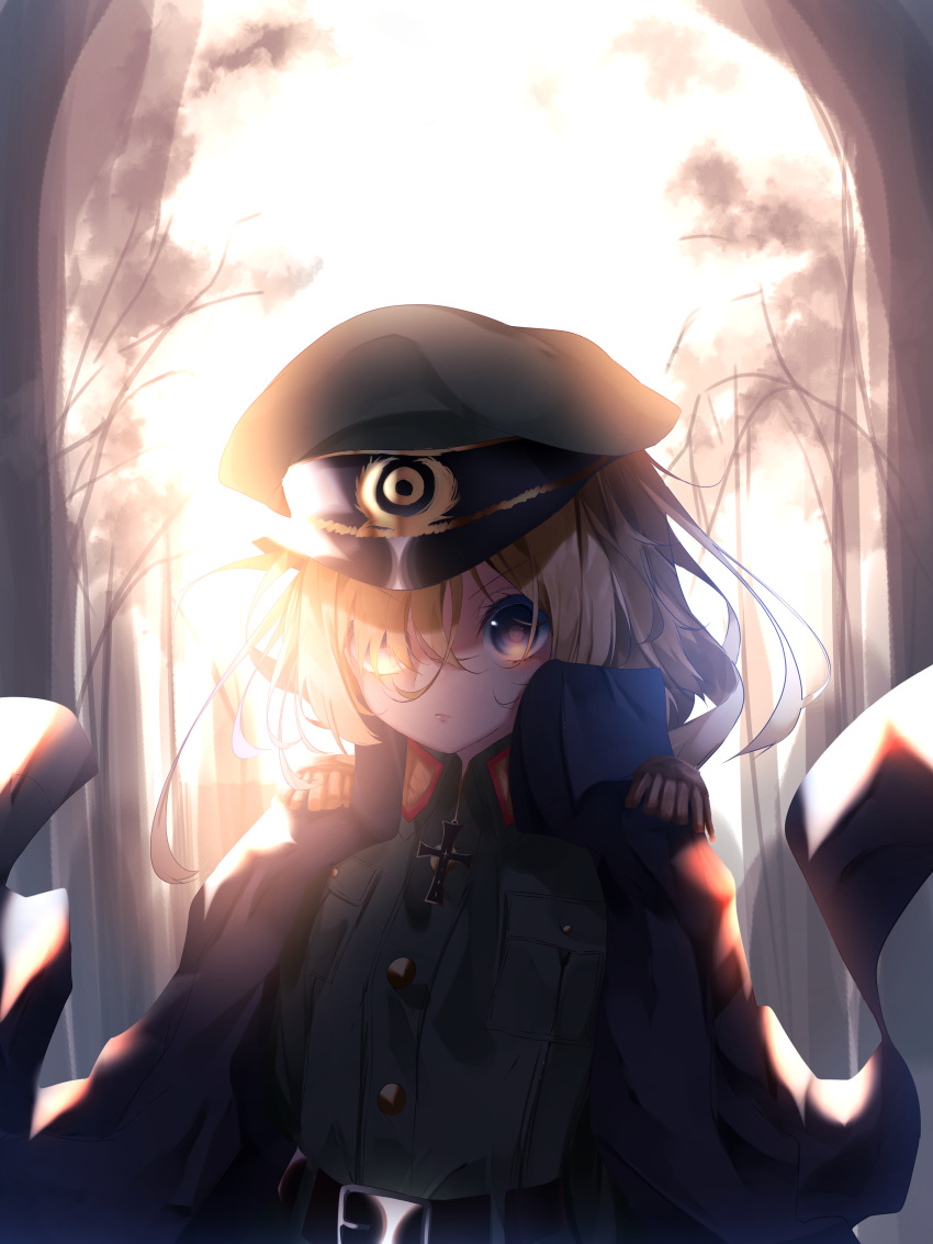 1girl absurdres blonde_hair blue_eyes closed_mouth commentary_request cross eyebrows_visible_through_hair hair_between_eyes hair_over_one_eye hat highres looking_at_viewer messy_hair military military_uniform short_hair solo suisen-21 sunlight tanya_degurechaff uniform youjo_senki