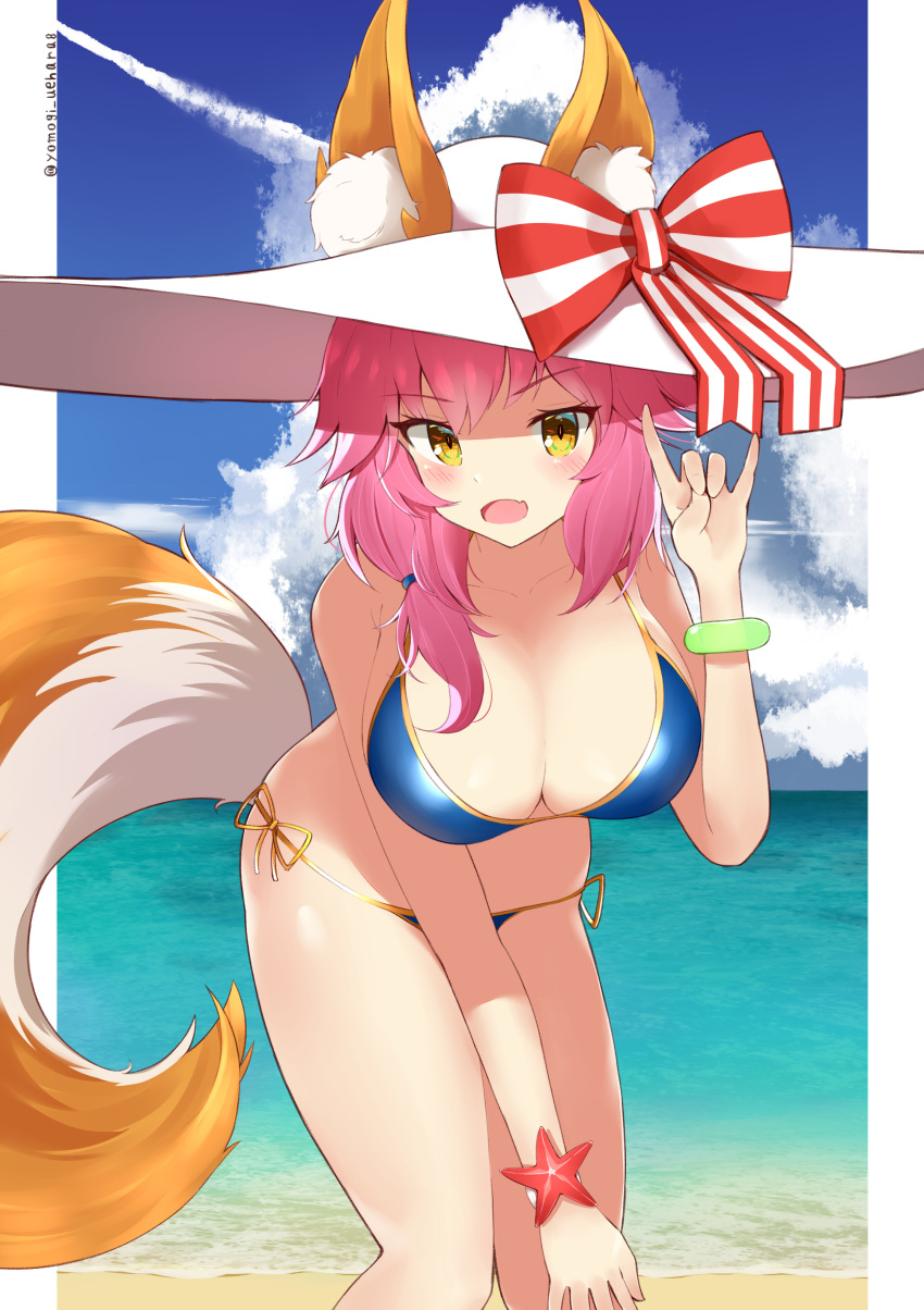 1girl absurdres animal_ear_fluff animal_ears beach bikini blue_bikini blue_sky bracelet breasts clouds day ears_through_headwear fate/grand_order fate_(series) fox_ears fox_girl fox_tail hat highres jewelry large_breasts ocean outdoors pink_hair side-tie_bikini sky solo sun_hat swimsuit tail tamamo_(fate)_(all) tamamo_no_mae_(swimsuit_lancer)_(fate) yellow_eyes yomogi_uehara