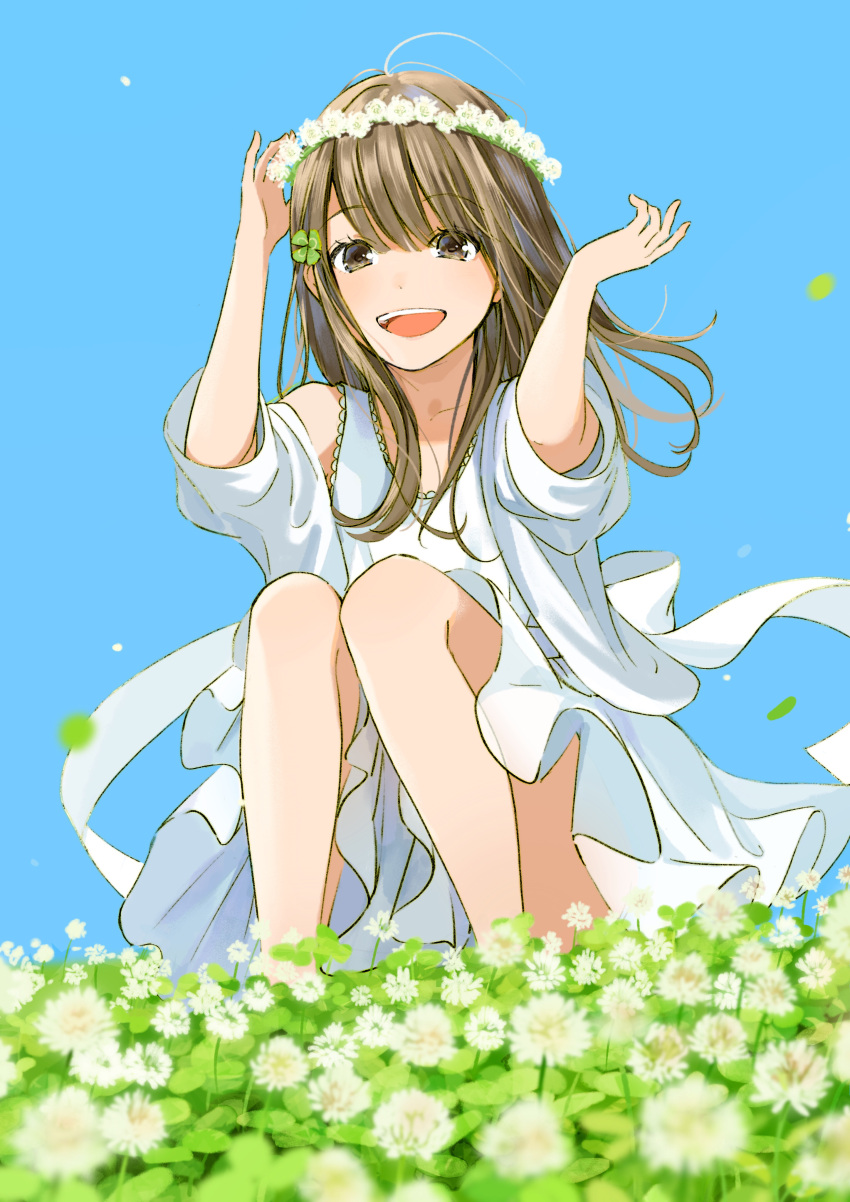 1girl absurdres brown_eyes brown_hair clover clover_hair_ornament day dress eyebrows_visible_through_hair field flower four-leaf_clover hair_ornament head_wreath highres leaf looking_at_viewer medium_hair open_mouth original outdoors sako_(user_ndpz5754) smile solo squatting thighs white_dress wind