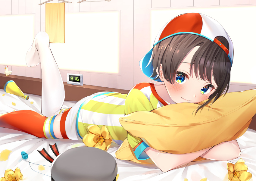 1girl absurdres bangs black_hair black_headwear blue_eyes blush breasts clock commentary_request eyebrows_visible_through_hair hair_ornament hat highres hololive looking_at_viewer lying multicolored multicolored_clothes multicolored_hat multicolored_shirt nari_(narikashi) on_stomach oozora_subaru pillow pillow_hug red_headwear red_legwear red_shirt ribbon shirt short_hair short_shorts short_sleeves shorts smile socks solo sportswear striped striped_shirt virtual_youtuber white_legwear white_shirt white_shorts yellow_pillow yellow_shirt