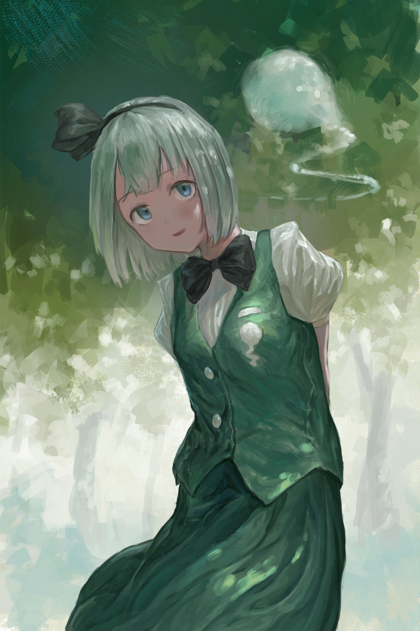 1girl arms_behind_back black_hairband blue_eyes blurry bow bowtie depth_of_field faux_traditional_media fjsmu forest green_skirt green_vest hairband happy head_tilt highres hitodama konpaku_youmu konpaku_youmu_(ghost) looking_at_viewer nature puffy_short_sleeves puffy_sleeves short_hair short_sleeves silver_hair skirt skirt_set smile solo touhou tree vest