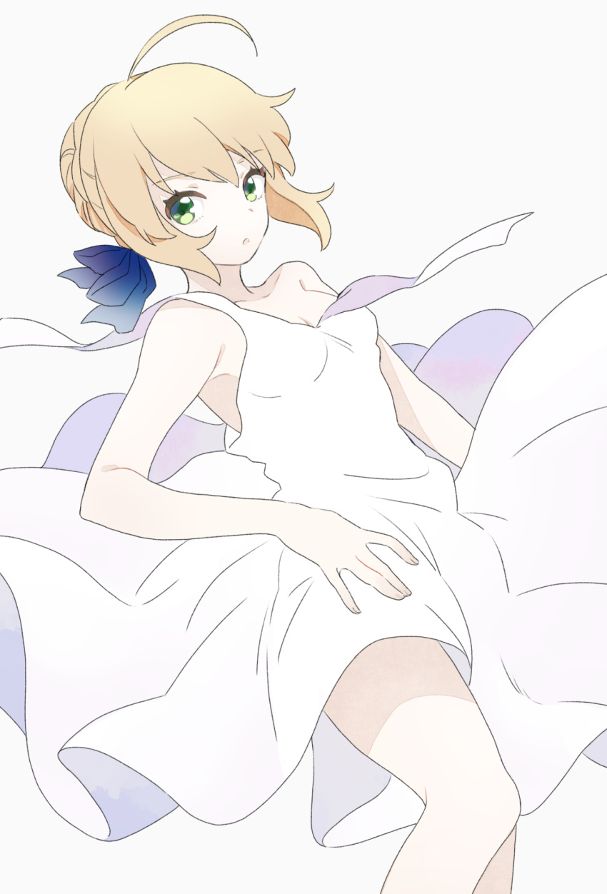 1girl :o ahoge artoria_pendragon_(all) bangs blonde_hair blue_bow bow breasts collarbone commentary dress eyebrows_visible_through_hair fate/stay_night fate_(series) green_eyes hair_bow hair_ornament highres long_hair looking_at_viewer open_mouth saber simple_background sleeveless small_breasts solo suzuakks white_background white_dress