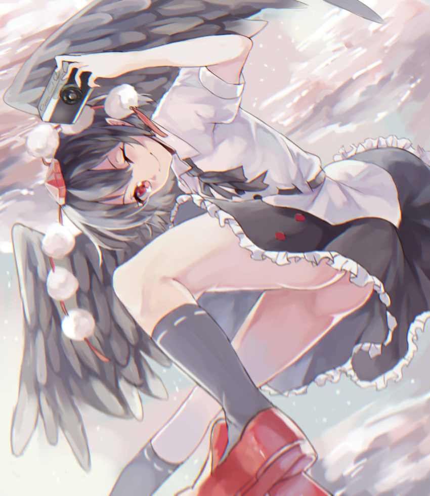 1girl ;) arm_up ass bangs black_hair black_legwear black_neckwear black_ribbon black_skirt black_wings blurry camera commentary_request feathered_wings feet_out_of_frame geta hair_between_eyes hat highres holding holding_camera kani_nyan kneehighs looking_at_viewer miniskirt neck_ribbon one_eye_closed outdoors petticoat pointy_ears pom_pom_(clothes) puffy_short_sleeves puffy_sleeves red_eyes red_footwear ribbon shameimaru_aya shirt short_hair short_sleeves skirt smile solo tassel tengu-geta thighs tokin_hat touhou white_shirt wings