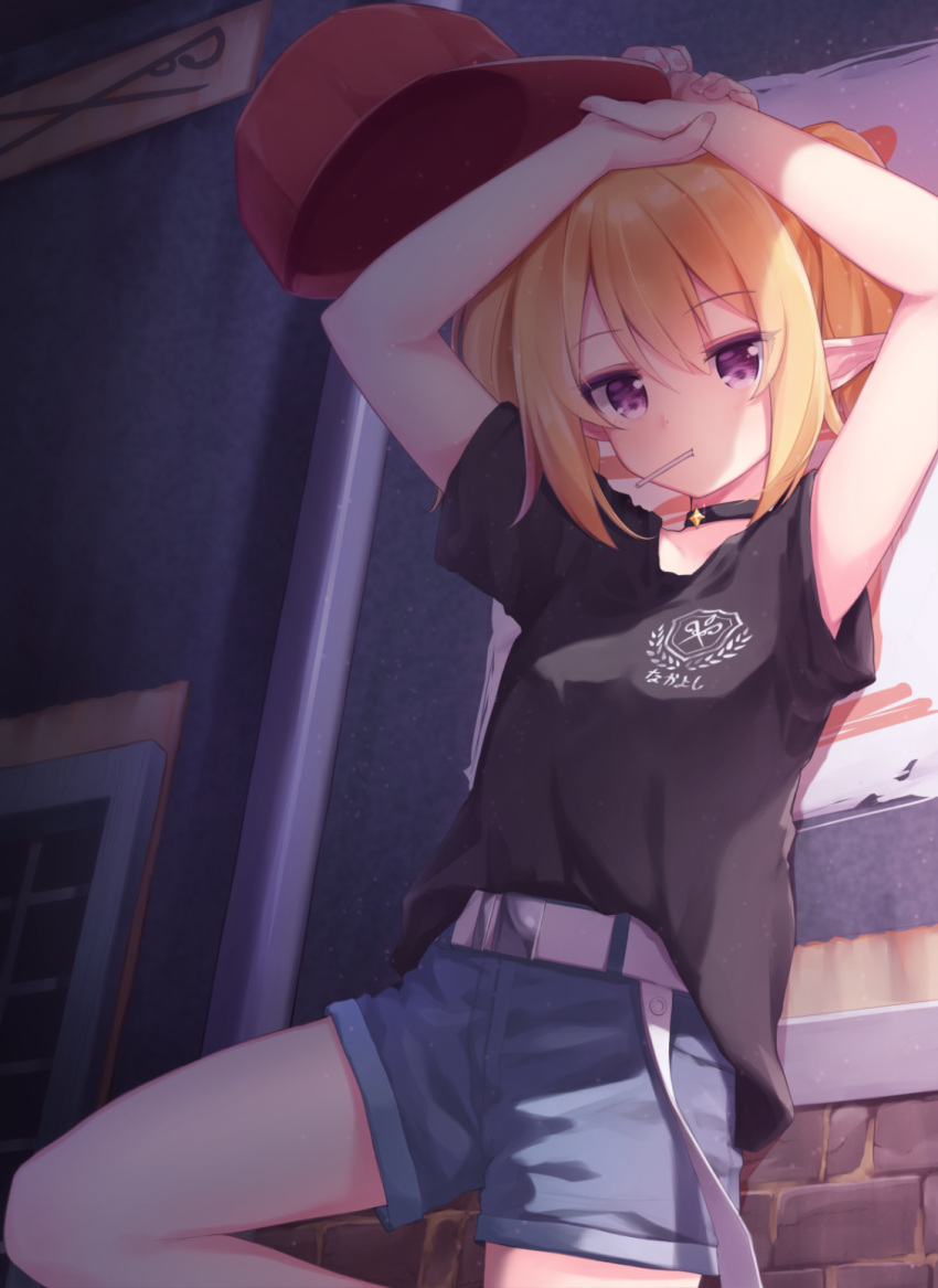 1girl against_wall arms_up baseball_cap belt black_shirt blonde_hair blue_shorts candy chloe_(princess_connect) choker elf food hat headwear_removed highres indoors knee_up leaning_back lollipop long_hair mouth_hold pink_eyes pointy_ears princess_connect! princess_connect!_re:dive red_headwear shirt short_shorts short_sleeves shorts solo t-shirt tokenbox twintails