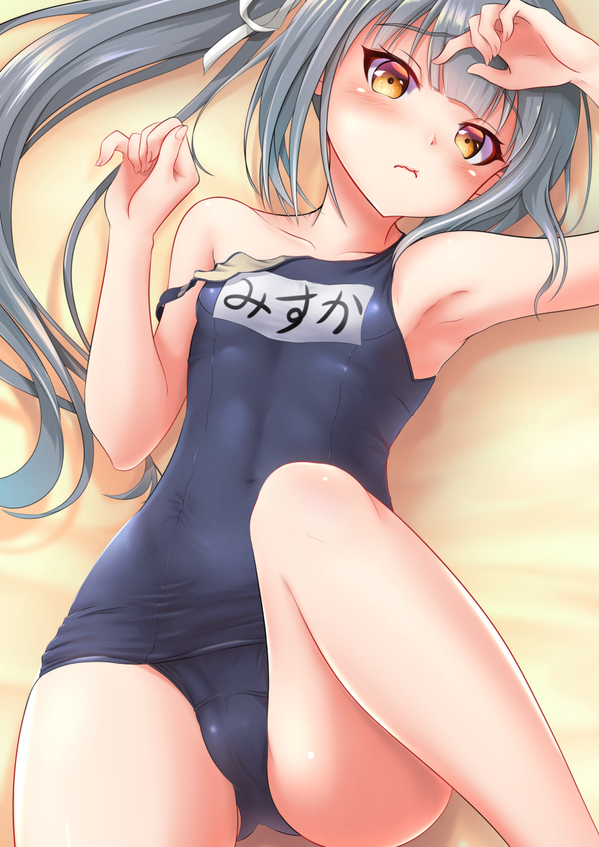 1girl absurdres armpits blue_swimsuit brown_eyes commentary_request cowboy_shot flat_chest grey_hair highres kantai_collection kasumi_(kantai_collection) long_hair looking_at_viewer lying makura_(user_jpmm5733) name_tag sand school_swimsuit school_uniform side_ponytail silver_hair solo swimsuit swimsuit_pull