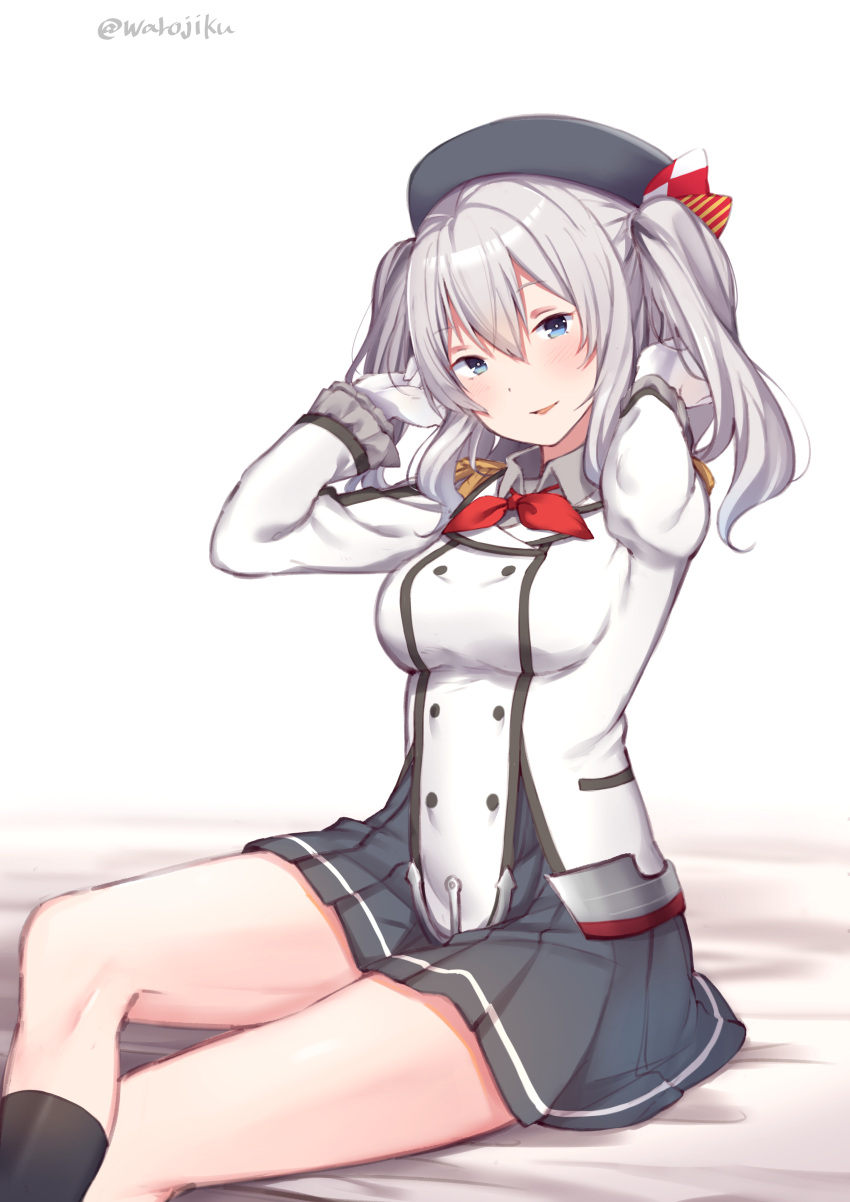 1girl absurdres anchor bangs bed_sheet beret black_legwear black_skirt blue_eyes blush breasts buttons epaulettes eyebrows_visible_through_hair frilled_sleeves frills gloves hat highres kantai_collection kashima_(kantai_collection) kerchief long_hair long_sleeves medium_breasts military military_uniform open_mouth pleated_skirt red_neckwear silver_hair simple_background sitting skirt socks solo twintails twitter_username uniform warojiku wavy_hair white_background white_gloves