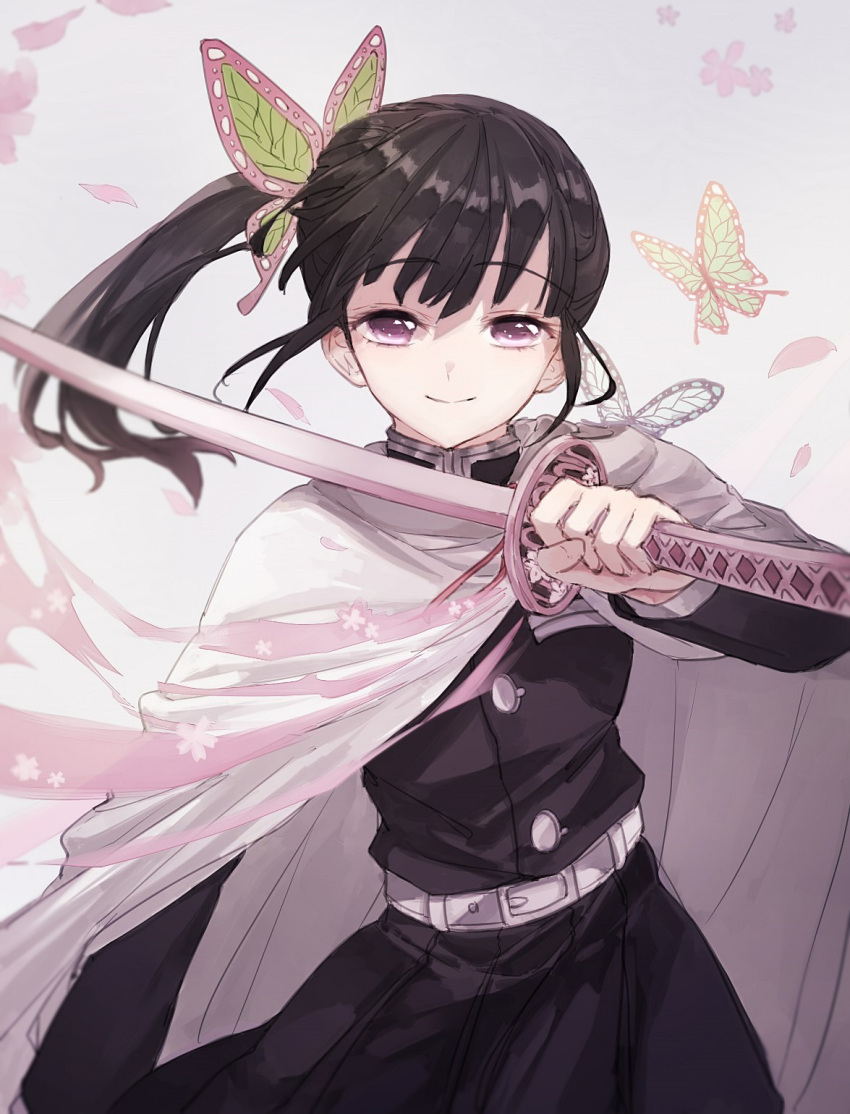 1girl black_hair black_skirt bug butterfly butterfly_hair_ornament cloak coat cowboy_shot eugeboy_zzzzz eyebrows_visible_through_hair grey_background hair_ornament highres insect katana kimetsu_no_yaiba long_sleeves looking_at_viewer medium_hair petals side_ponytail simple_background skirt smile solo sword tsuyuri_kanao uniform violet_eyes weapon wind