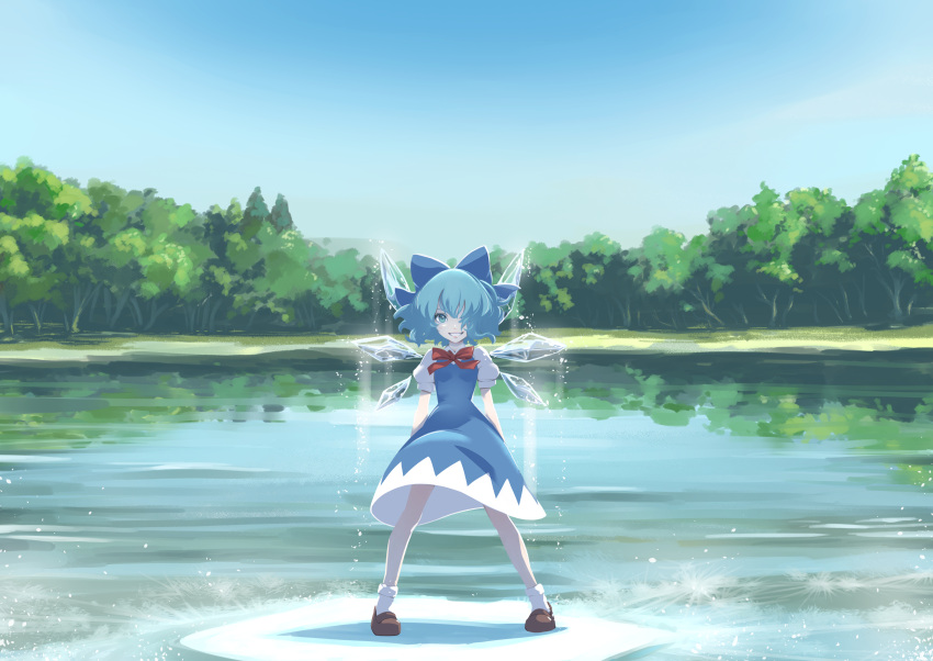 1girl absurdres blue_bow blue_dress blue_eyes blue_hair blue_sky bow bowtie brown_footwear cirno clouds commentary day dress forest full_body grin hair_bow hair_over_one_eye highres ice ice_wings kawayabug lake light_particles looking_at_viewer nature outdoors pinafore_dress puffy_short_sleeves puffy_sleeves red_bow red_neckwear shadow shirt shoes short_hair short_sleeves sky smile socks solo standing touhou tree water white_legwear white_shirt wings