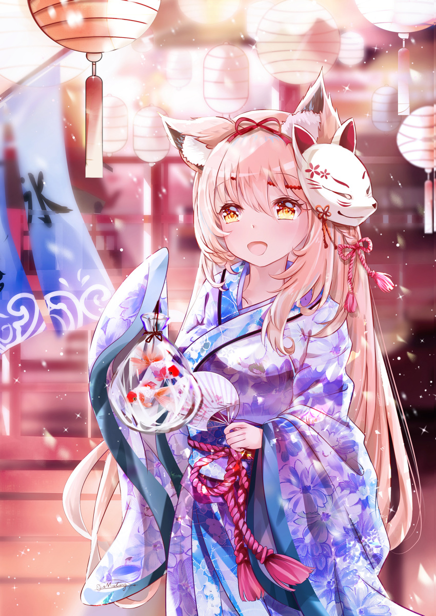 1girl :d animal_ear_fluff animal_ears bag bagged_fish bangs blue_kimono blurry blurry_background blush commentary_request depth_of_field eyebrows_visible_through_hair fan fish floral_print fox_mask goldfish hair_between_eyes highres holding holding_fan japanese_clothes kimono lantern light_brown_hair long_hair long_sleeves looking_at_viewer mask mask_on_head mutang obi open_mouth original paper_fan paper_lantern print_kimono sash sleeves_past_fingers sleeves_past_wrists smile solo uchiwa very_long_hair wide_sleeves yellow_eyes yukata