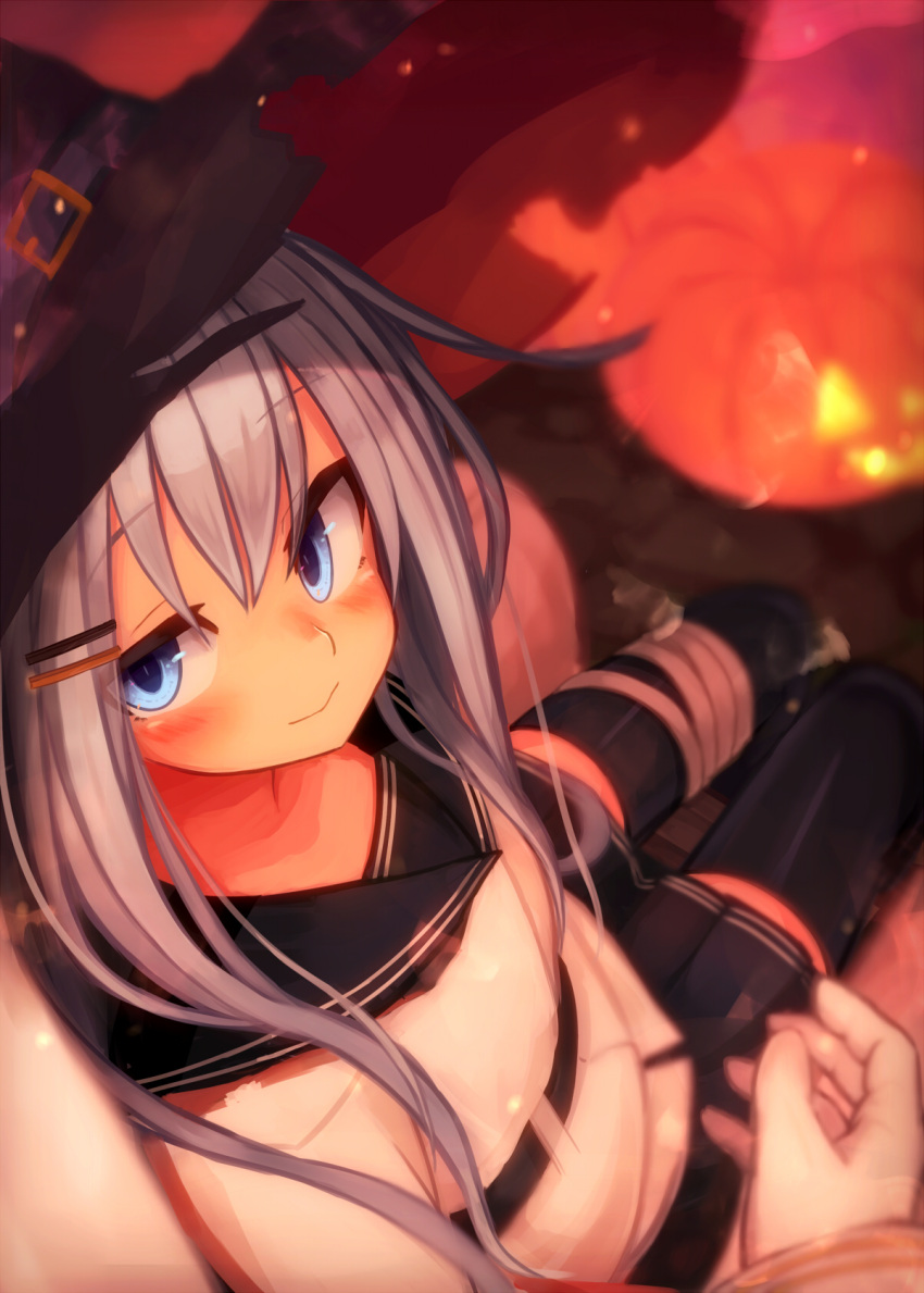 1girl bandaged_leg bandages bangs black_legwear blue_eyes blush commentary eyebrows_visible_through_hair gloves hair_ornament hairclip halloween hat hibiki_(kantai_collection) highres jack-o'-lantern kantai_collection long_hair long_sleeves out_of_frame pleated_skirt pumpkin reitou_mikan school_uniform serafuku silver_hair sitting skirt smile thigh-highs torn_clothes torn_hat verniy_(kantai_collection) white_gloves witch_hat