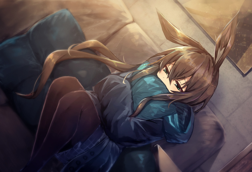 1girl amiya_(arknights) animal_ear_fluff animal_ears arknights bangs black_jacket blue_skirt blush brown_hair brown_legwear commentary couch covered_mouth dutch_angle eyebrows_visible_through_hair feet_out_of_frame green_eyes hair_between_eyes highres hood hood_down hooded_jacket indoors jacket knees_up long_hair long_sleeves on_couch open_clothes open_jacket pantyhose pillow pillow_hug pleated_skirt rabbit_ears shinopoko sitting skirt sleeves_past_fingers sleeves_past_wrists solo very_long_hair