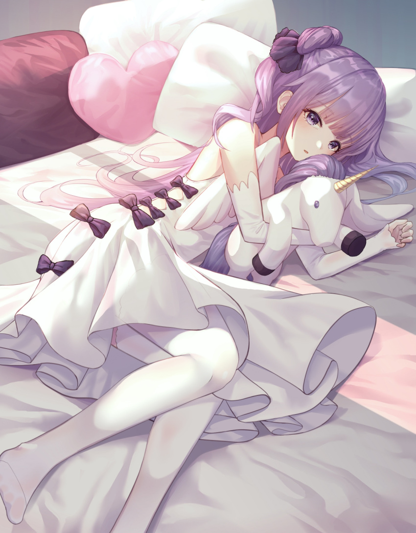 1girl azur_lane bangs bed black_bow black_ribbon blush bow detached_sleeves dress eyebrows_visible_through_hair hair_bun hair_ribbon halterneck hands_up heart heart_pillow highres long_hair long_sleeves lying myung no_shoes object_hug on_side one_side_up parted_lips pillow purple_hair ribbon side_bun sidelocks sleeves_past_wrists solo stuffed_alicorn stuffed_animal stuffed_toy thigh-highs unicorn_(azur_lane) very_long_hair violet_eyes white_dress white_legwear white_sleeves