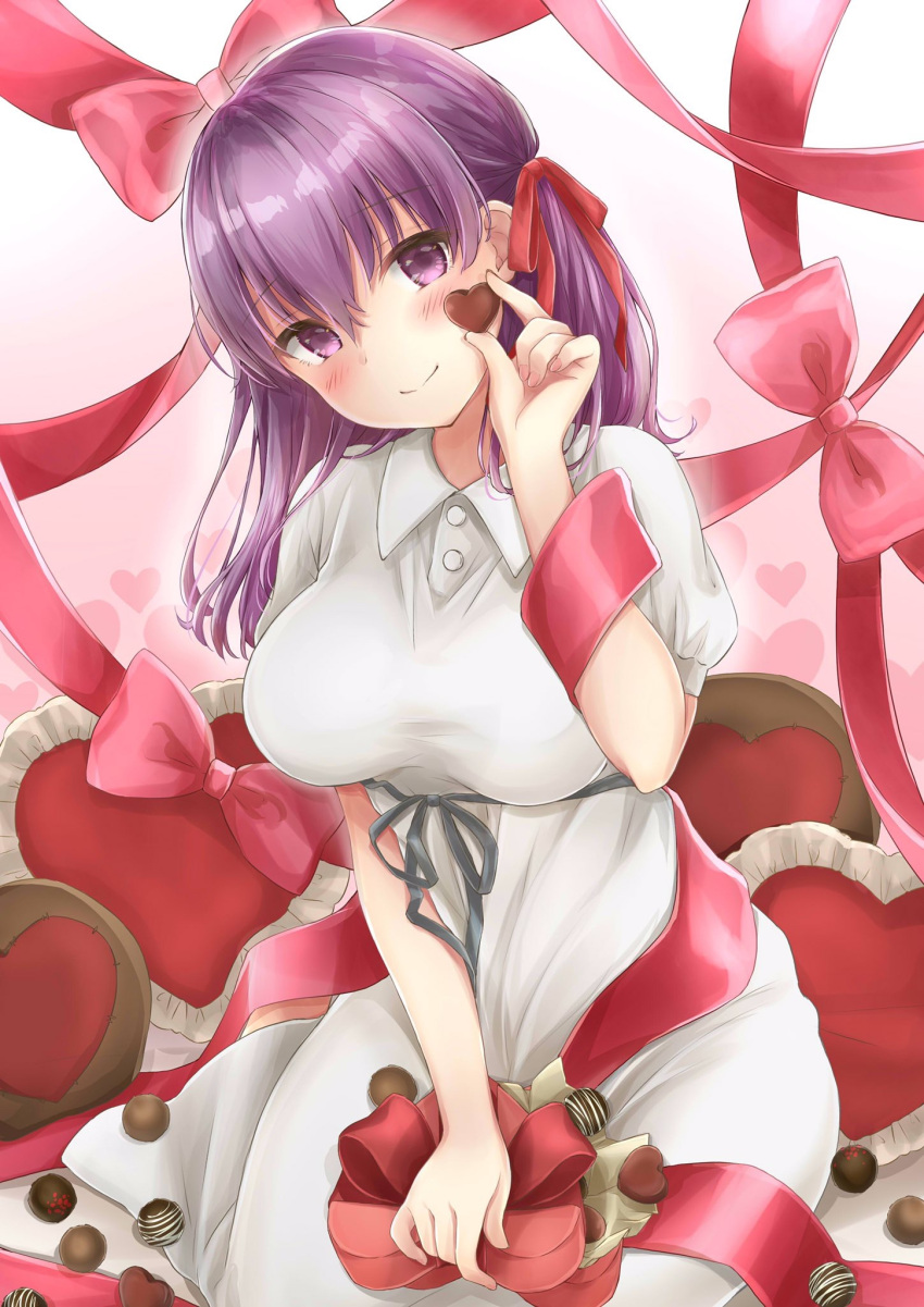 1girl blush breasts candy chocolate chocolate_heart commentary_request dress eyebrows_visible_through_hair fate/grand_order fate_(series) food hair_ribbon heart heart_pillow highres large_breasts long_hair looking_at_viewer matou_sakura mikujin_(mikuzin24) pillow pink_ribbon purple_hair ribbon sitting smile solo violet_eyes
