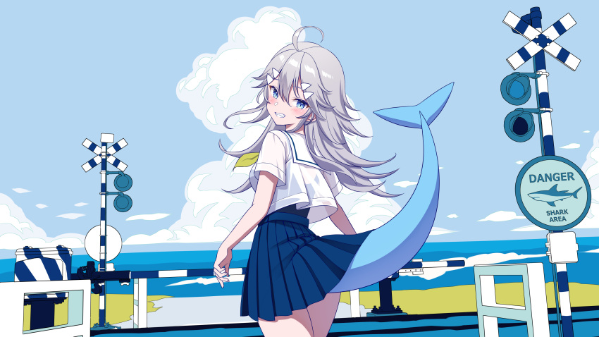 1girl absurdres ahoge blue_eyes blue_skirt blue_sky clouds commentary_request from_behind fukanomi_kafka grey_hair grin hair_between_eyes high-waist_skirt highres horizon iriam long_hair looking_at_viewer looking_back ocean outdoors pleated_skirt railroad_crossing railroad_signal sailor_collar school_uniform serafuku shark_girl shark_tail shimashima08123 shirt shirt_overhang short_sleeves skirt sky smile solo standing virtual_youtuber white_shirt