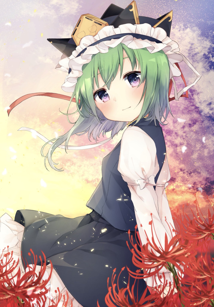 1girl arms_behind_back bangs black_skirt blue_vest blush commentary_request cowboy_shot flower frilled_hat frills green_hair hat hat_ribbon head_tilt highres juliet_sleeves karasusou_nano long_sleeves looking_at_viewer outdoors petticoat puffy_sleeves red_flower red_ribbon ribbon shiki_eiki shirt short_hair skirt smile solo spider_lily standing touhou vest violet_eyes white_ribbon white_shirt