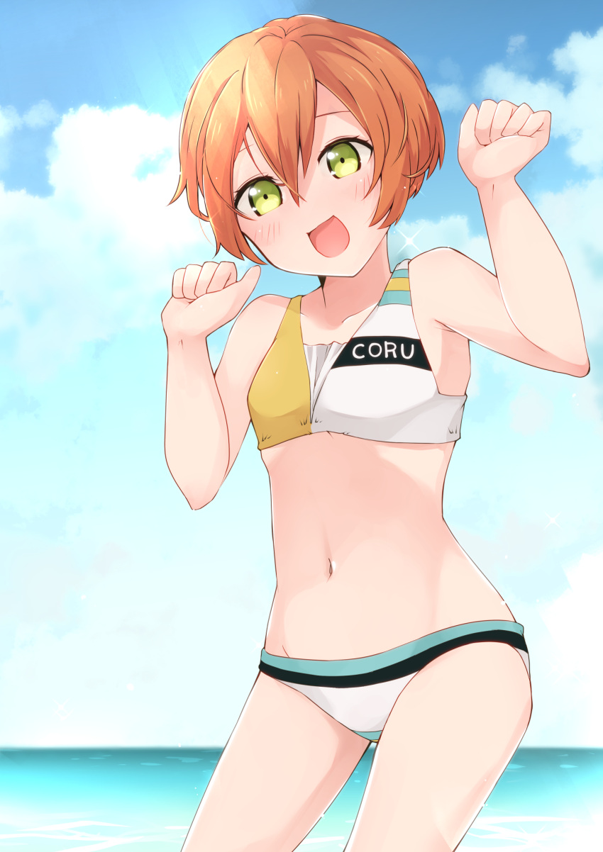 1girl :d bangs bare_arms bare_shoulders bikini blue_sky blush breasts clothes_writing clouds collarbone cowboy_shot day green_eyes groin hair_between_eyes hands_up highres hoshizora_rin legs_apart looking_at_viewer love_live! love_live!_school_idol_project misoradeko navel no_nose ocean open_mouth orange_hair outdoors short_hair sky small_breasts smile solo swimsuit water