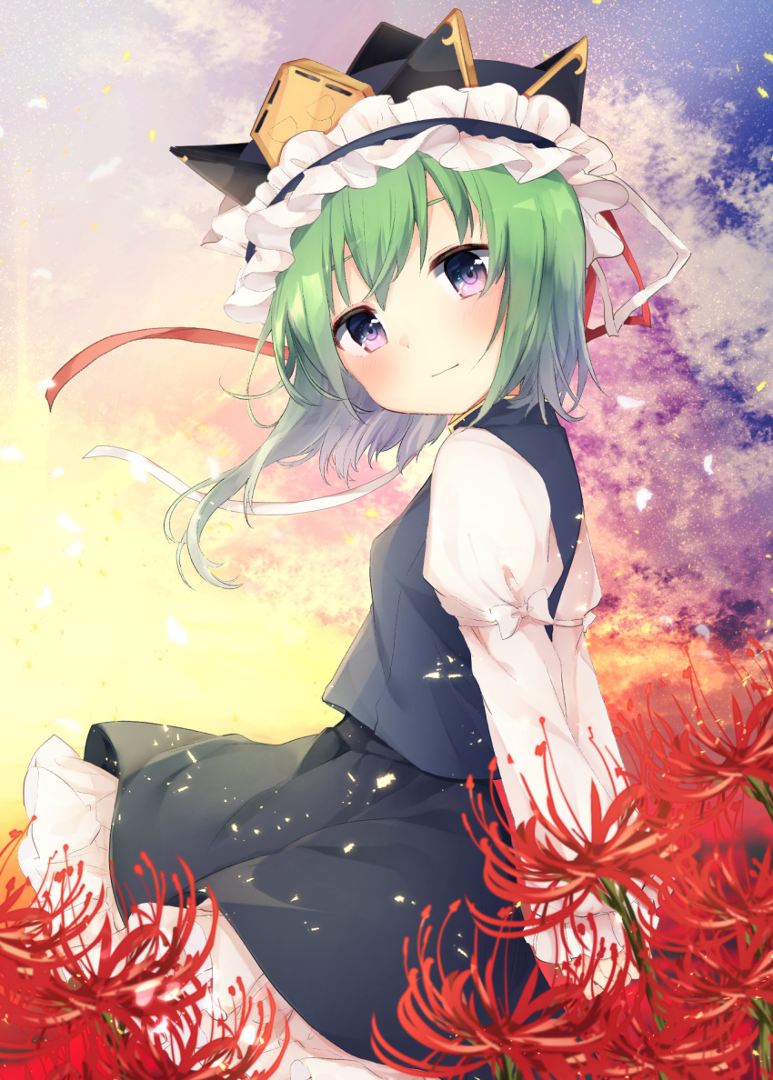1girl arms_behind_back bangs black_skirt blue_vest blush commentary_request cowboy_shot flower frilled_hat frills green_hair hat hat_ribbon head_tilt highres juliet_sleeves karasusou_nano long_sleeves looking_at_viewer outdoors petticoat puffy_sleeves red_flower red_ribbon ribbon shiki_eiki shirt short_hair skirt smile solo spider_lily standing touhou vest violet_eyes white_ribbon white_shirt