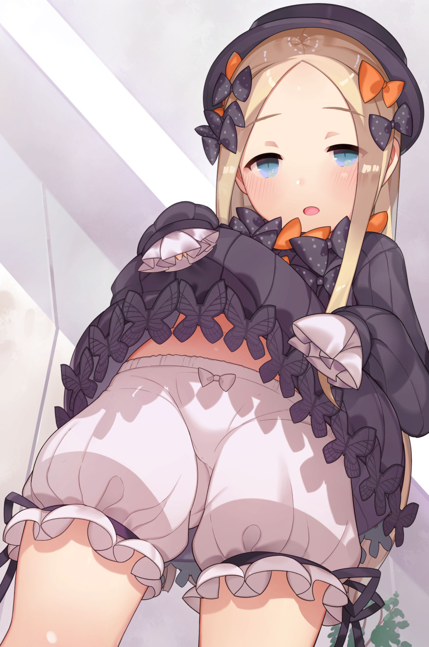 1girl abigail_williams_(fate/grand_order) absurdres black_bow black_dress black_headwear blonde_hair bloomers blue_eyes bow dress fate/grand_order fate_(series) from_below gothic_lolita hat highres lifted_by_self lolita_fashion looking_at_viewer nekotewi orange_bow polka_dot polka_dot_bow skirt skirt_lift sleeves_past_fingers sleeves_past_wrists solo underwear