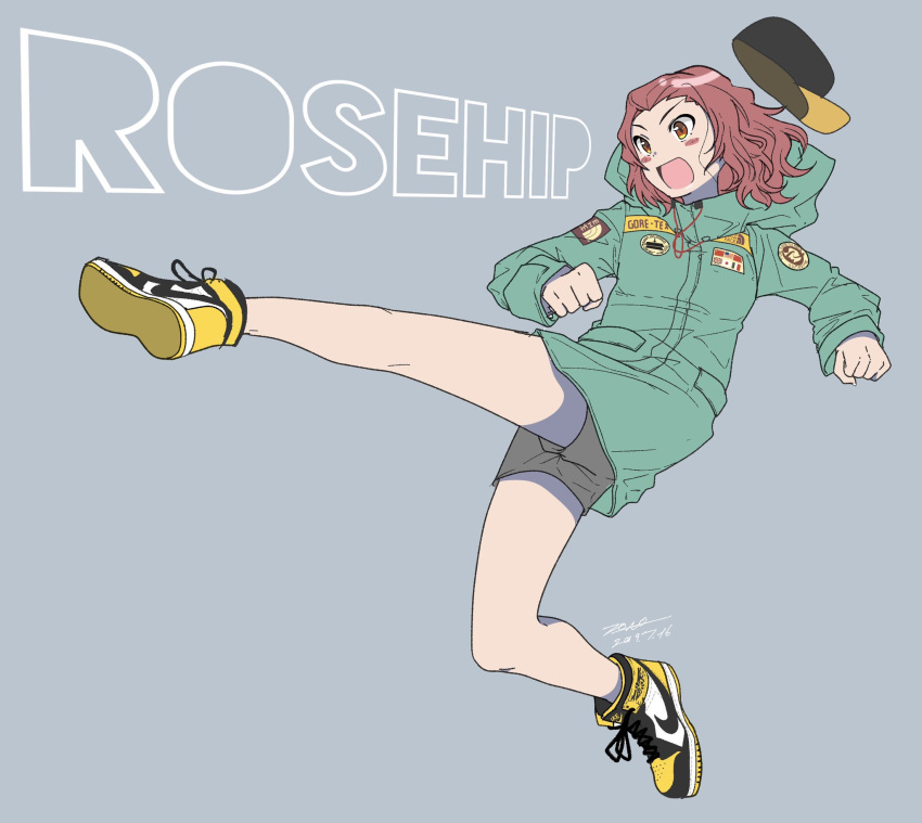 1girl :d air_jordan_1 artist_name baseball_cap black_headwear blush_stickers brown_eyes casual character_name clenched_hands cloak dated english_commentary girls_und_panzer green_coat grey_background grey_shorts hat high_tops highres hood hooded_cloak jumping kicking leg_up logo long_sleeves medium_hair nike open_mouth redhead rosehip shoes short_shorts shorts signature simple_background smile solo yellow_footwear zono_(inokura_syuzo029)