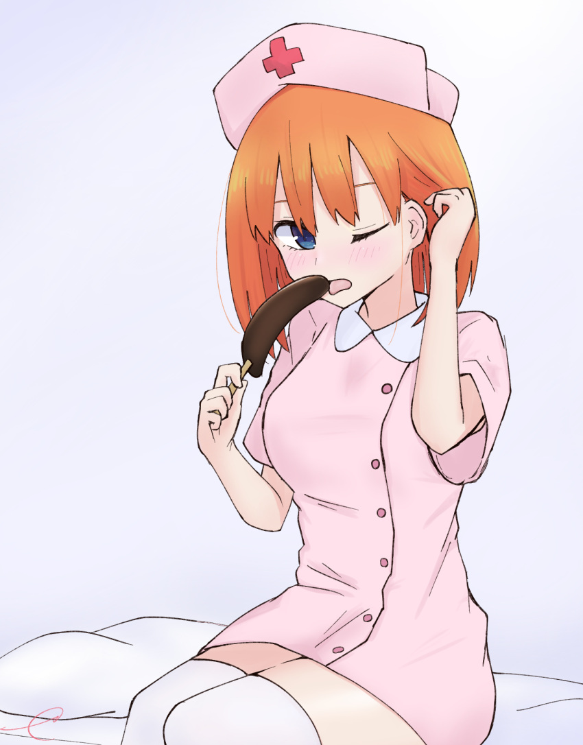 1girl alternate_costume bangs bed_sheet blue_eyes blush breasts chocolate_banana collared_dress cross dress eyebrows_behind_hair food go-toubun_no_hanayome grey_background hair_tucking hat highres holding holding_food kujou_karasuma looking_at_viewer medium_breasts nakano_yotsuba nurse_cap one_eye_closed open_mouth orange_hair pillow pink_dress pink_headwear short_sleeves signature sitting solo thigh-highs tongue tongue_out white_legwear