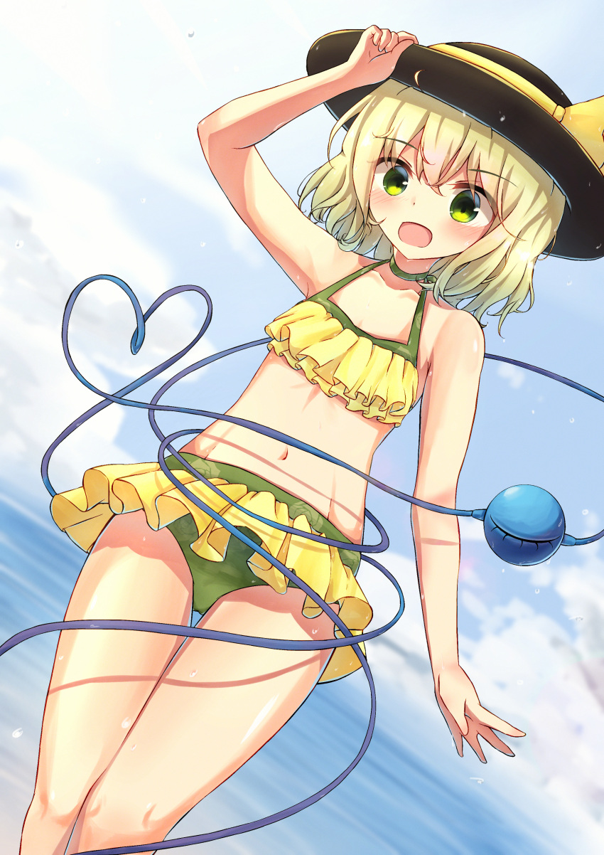 1girl absurdres alternate_costume arm_up bikini black_headwear blonde_hair blue_sky blush breasts clouds commentary_request cowboy_shot day eyeball eyebrows_visible_through_hair floral_print frilled_bikini frills green_bikini green_eyes green_swimsuit hair_between_eyes hand_on_headwear hat hat_ribbon heart heart_of_string highres komeiji_koishi ocean open_mouth outdoors ribbon sachisudesu short_hair sky small_breasts solo string swimsuit third_eye touhou water wavy_hair wet yellow_ribbon