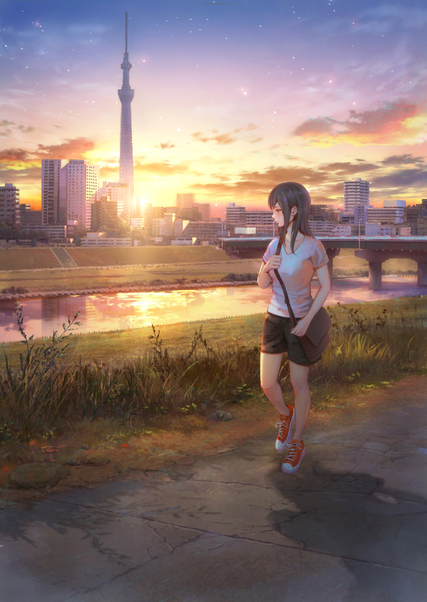 1girl bag black_hair black_shorts bridge building cityscape grass handbag highres lamppost long_hair original red_footwear reflection river scenery shadow sho_(shoichi-kokubun) shoes shorts sidewalk skyscraper sneakers solo stairs sunset tokyo_sky_tree walking