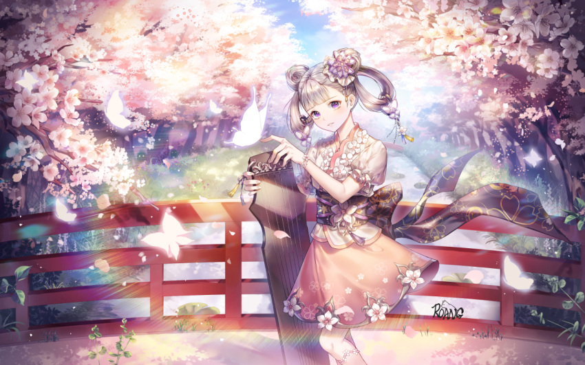 1girl artist_name bangs bridge bug butterfly cherry_blossoms commentary_request day dress eyebrows_visible_through_hair flower hair_ornament holding insect leaf looking_at_viewer original outdoors pink_dress roang short_sleeves smile tree twintails violet_eyes water white_flower