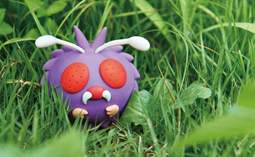 creature day fangs full_body gen_1_pokemon grass looking_at_viewer morii_yuka nature no_humans official_art outdoors photo pokemon pokemon_(creature) pokemon_trading_card_game red_eyes solo standing third-party_source venonat