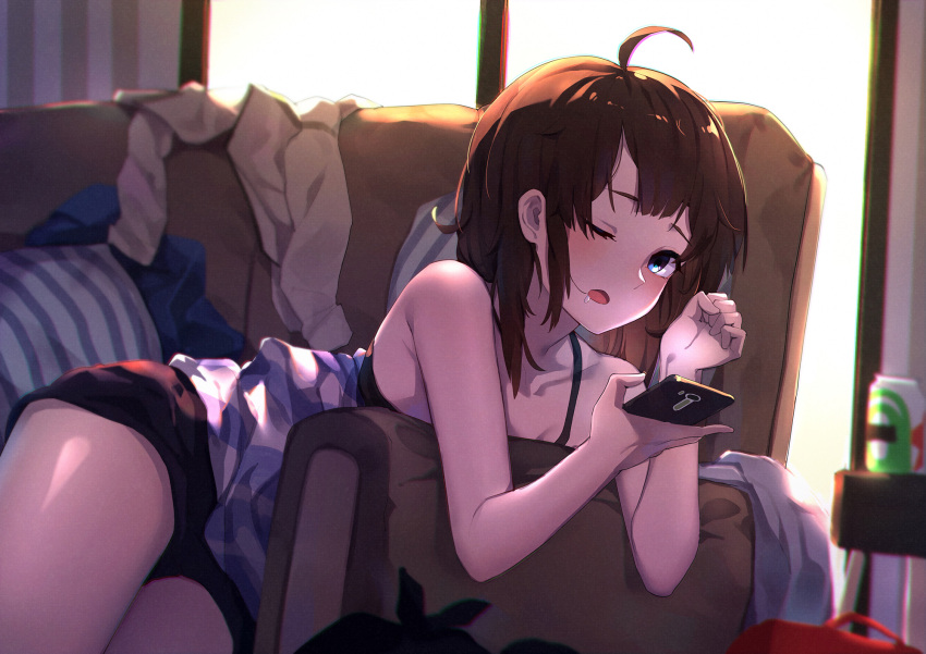 1girl ;o ahoge backlighting bangs bare_arms bare_shoulders black_bra black_shorts blue_eyes bra brown_hair can cellphone couch day drooling highres holding holding_cellphone holding_phone indoors looking_at_viewer mr.lime on_couch one_eye_closed open_mouth original phone pillow saliva short_hair short_shorts shorts sleeveless smartphone soda_can solo towel trash_bag underwear