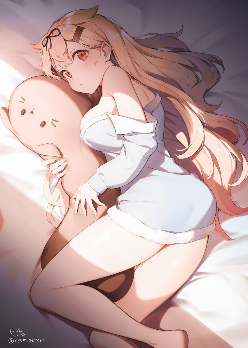 1girl absurdres animal_pillow bangs bare_shoulders bed_sheet blonde_hair blush breasts eyebrows_visible_through_hair hair_flaps hair_ornament hair_ribbon hairclip highres kantai_collection large_breasts long_hair long_sleeves lying nyum off_shoulder on_side open_mouth pillow red_eyes remodel_(kantai_collection) ribbon shirt signature solo twitter_username yuudachi_(kantai_collection)