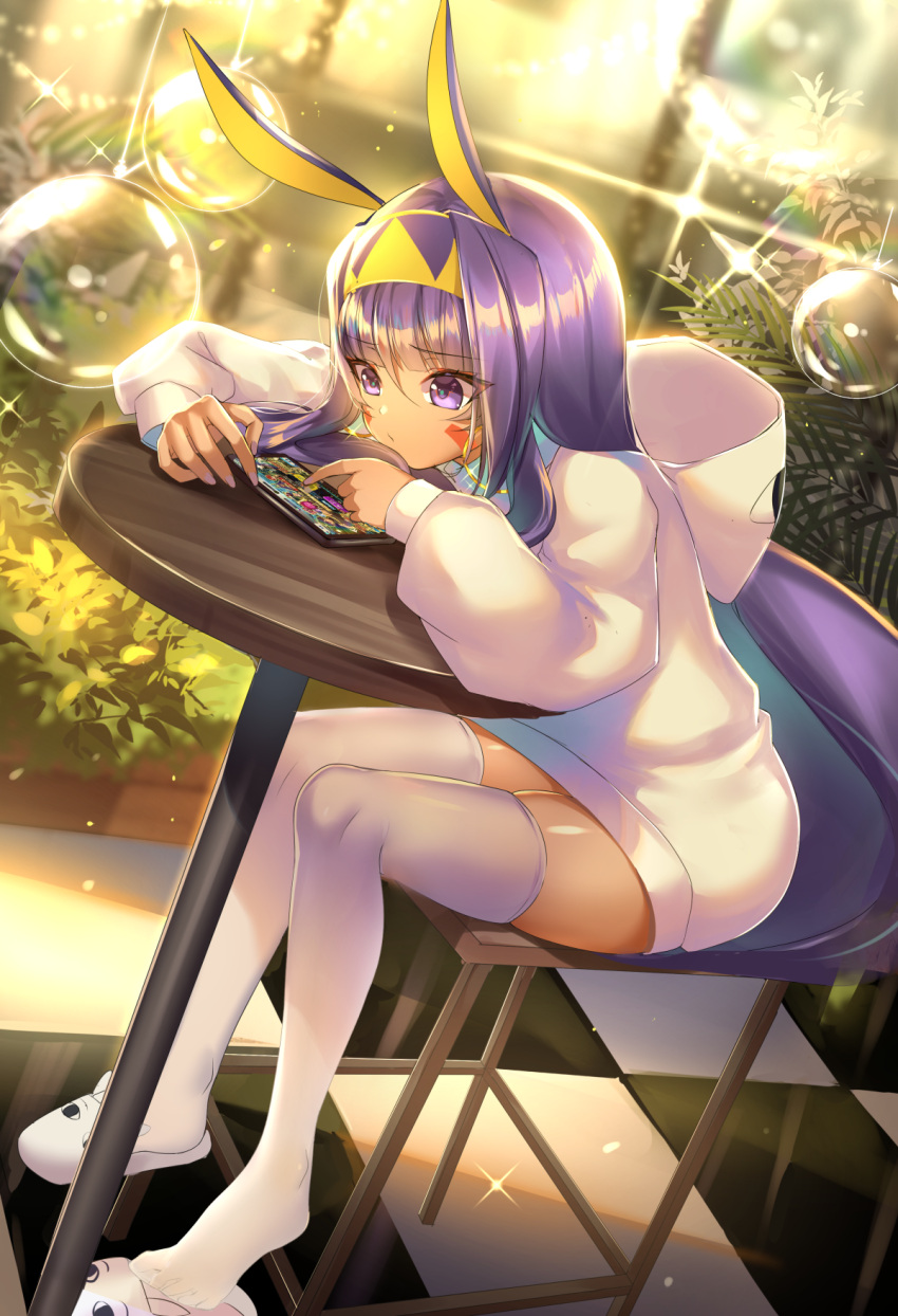 1girl animal_ears animal_slippers bangs blunt_bangs bubble casual cellphone checkered checkered_floor dark_skin dutch_angle eyebrows_visible_through_hair facial_mark fate_(series) focused foot_dangle full_body hair_strand hairband highres hood hood_down hoodie jackal_ears jewelry k.k_(pixiv) long_hair long_sleeves looking_away nitocris_(fate/grand_order) phone plant playing_games poking purple_hair shoes sidelocks single_shoe sitting skindentation slippers smartphone solo sparkle stool table thigh-highs touchscreen very_long_hair violet_eyes white_footwear white_legwear zettai_ryouiki