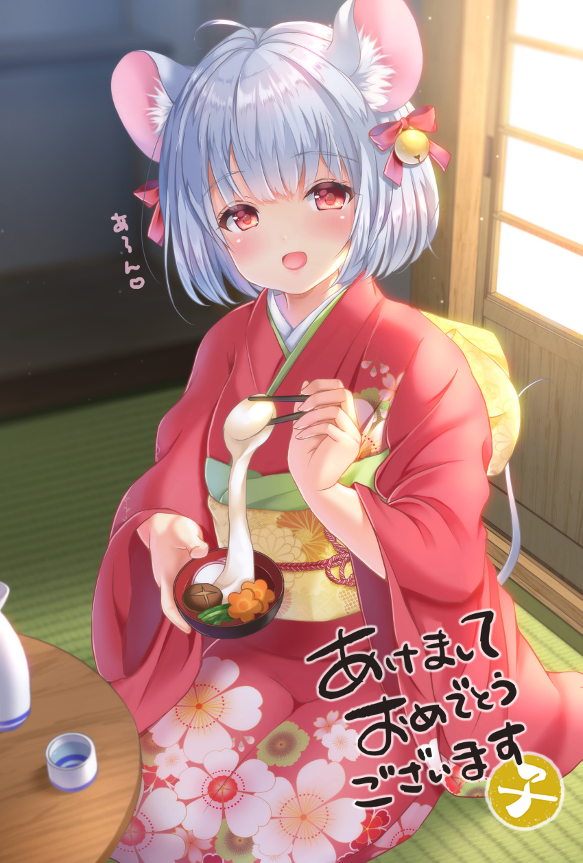 1girl :d absurdres ahoge animal_ear_fluff animal_ears bangs bell blurry blurry_background blush bow bowl chopsticks commentary_request depth_of_field eyebrows_visible_through_hair floral_print grey_hair hair_bell hair_bow hair_ornament happy_new_year highres holding holding_bowl holding_chopsticks indoors japanese_clothes jingle_bell kimono looking_at_viewer mochi mouse_ears mouse_girl mouse_tail new_year obi open_mouth original pink_kimono print_kimono red_bow red_eyes sash seiza short_hair sitting smile solo table tail yuyuko_(yuyucocco)