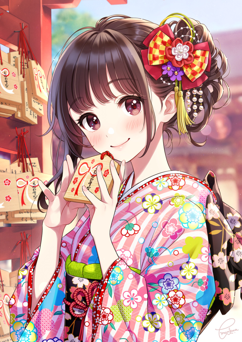 1girl bangs blurry blurry_background blush brown_eyes brown_hair closed_mouth commentary_request depth_of_field ema eyebrows_visible_through_hair fingernails floral_print hair_ornament hands_up highres holding japanese_clothes kimono long_sleeves looking_at_viewer morikura_en obi original pink_nails print_kimono sash sidelocks signature smile solo striped upper_body vertical-striped_kimono vertical_stripes wide_sleeves