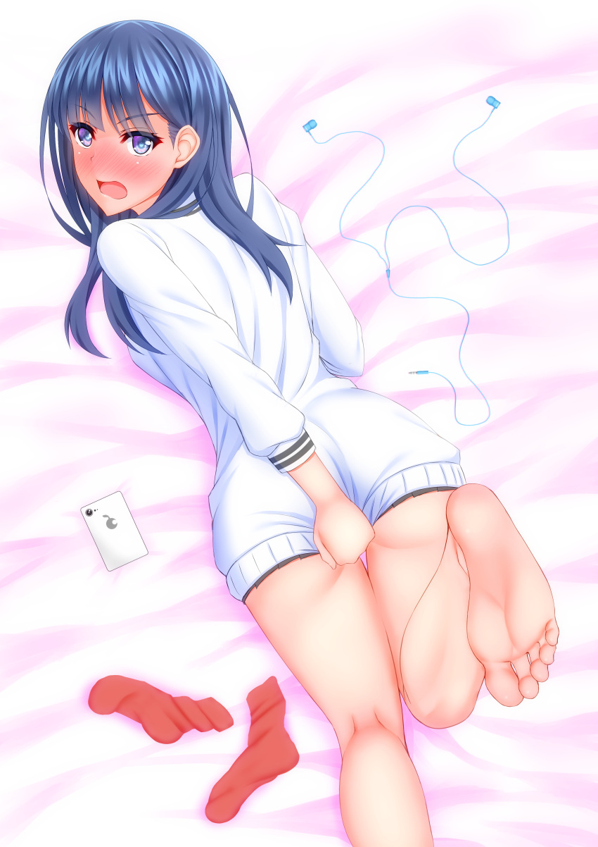 1girl absurdres ass bangs bare_legs barefoot bed_sheet blue_eyes blue_hair blush cellphone commentary_request covering covering_ass covering_crotch earphones earphones embarrassed eyelashes feet from_above from_behind full_body highres kneepits long_hair long_sleeves looking_at_viewer looking_back lying on_stomach open_mouth phone pleated_skirt red_footwear shirouzu_myuuta sidelocks skirt skirt_tug smartphone socks_removed solo ssss.gridman sweater takarada_rikka white_cardigan white_sweater
