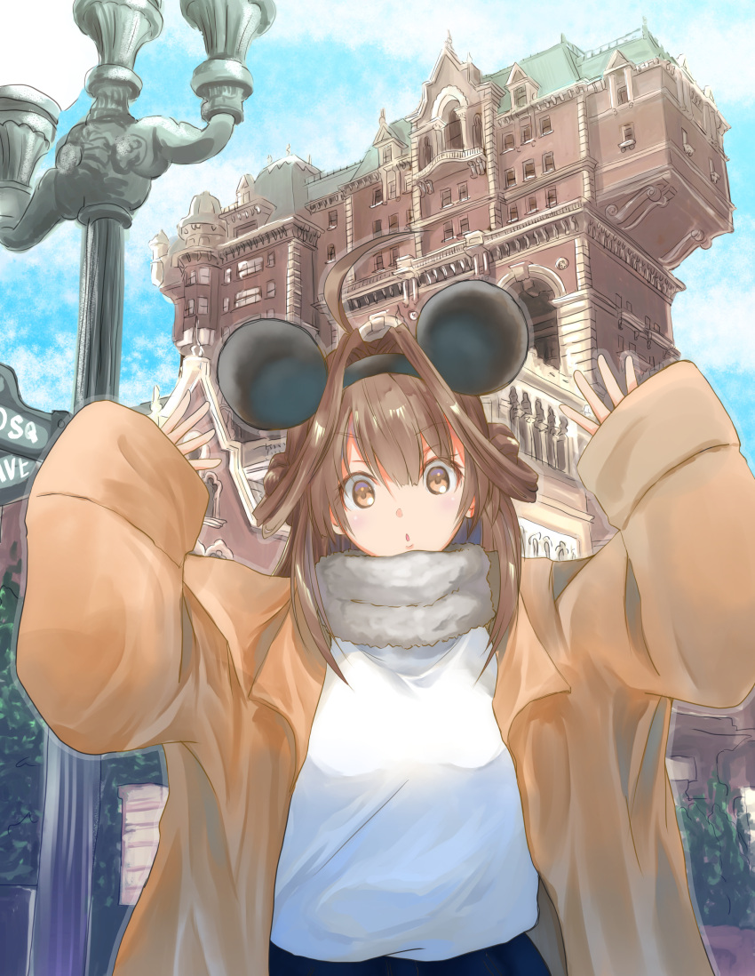 1girl absurdres ahoge alternate_costume arms_up blue_sky brown_coat brown_hair building chicken99 clouds coat commentary_request cowboy_shot day disneyland double_bun fur-trimmed_coat fur_trim highres kantai_collection kongou_(kantai_collection) lamppost long_hair looking_at_viewer outdoors road_sign sign sky solo sweater upper_body violet_eyes white_sweater
