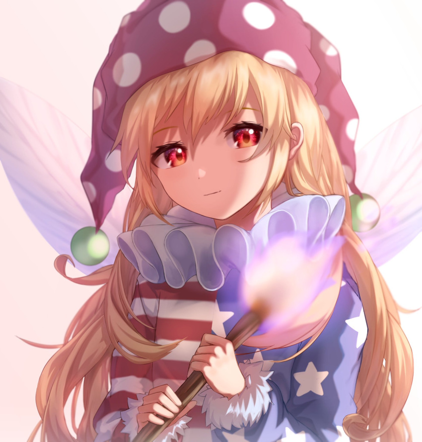 1girl american_flag_legwear blonde_hair closed_mouth clownpiece commentary_request fairy_wings fire fur_trim hair_between_eyes hat highres holding jester_cap light_smile long_hair long_sleeves looking_at_viewer mozuno_(mozya_7) neck_ruff pink_background red_eyes simple_background solo star star_print striped torch touhou wings