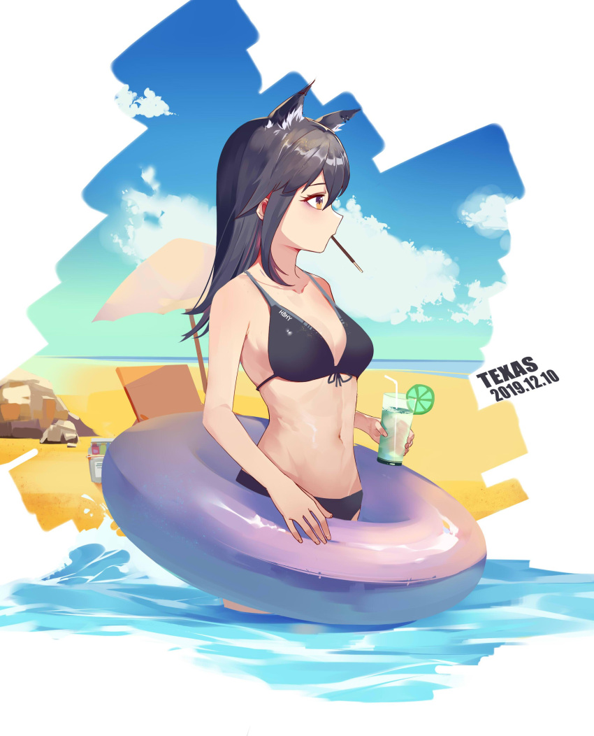 1girl absurdres animal_ears arknights bangs bare_arms bare_shoulders beach beach_umbrella bikini black_bikini black_hair blue_sky breasts brown_eyes character_name chinese_commentary clouds commentary_request cowboy_shot cup dated day drinking_glass drinking_straw food food_in_mouth from_side front-tie_bikini front-tie_top highres holding holding_cup innertube lime_slice long_hair medium_breasts mirwind_x mouth_hold navel outdoors pocky profile sky solo standing stomach swimsuit texas_(arknights) umbrella wading water wolf_ears
