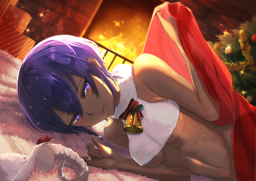1girl announ_(kurotya) bangs bare_shoulders bauble bell blanket blush box breasts carpet christmas commentary_request crop_top crop_top_overhang dark_skin dutch_angle fate/grand_order fate_(series) fire fireplace gift gift_box hassan_of_serenity_(fate) highres indoors looking_at_viewer lying medium_breasts merry_sheep navel on_floor on_side parted_lips purple_hair red_ribbon ribbon short_hair smile solo sparkle under_boob under_covers violet_eyes