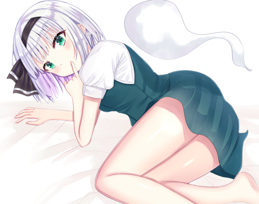 1girl arm_support bare_legs barefoot commentary eyebrows_visible_through_hair finger_to_mouth foot_out_of_frame green_eyes green_skirt green_vest hair_ribbon konpaku_youmu konpaku_youmu_(ghost) lying nibosisuzu on_bed on_side puffy_short_sleeves puffy_sleeves ribbon shiny shiny_hair shirt short_sleeves silver_hair simple_background skirt skirt_set smile solo touhou vest white_background white_shirt