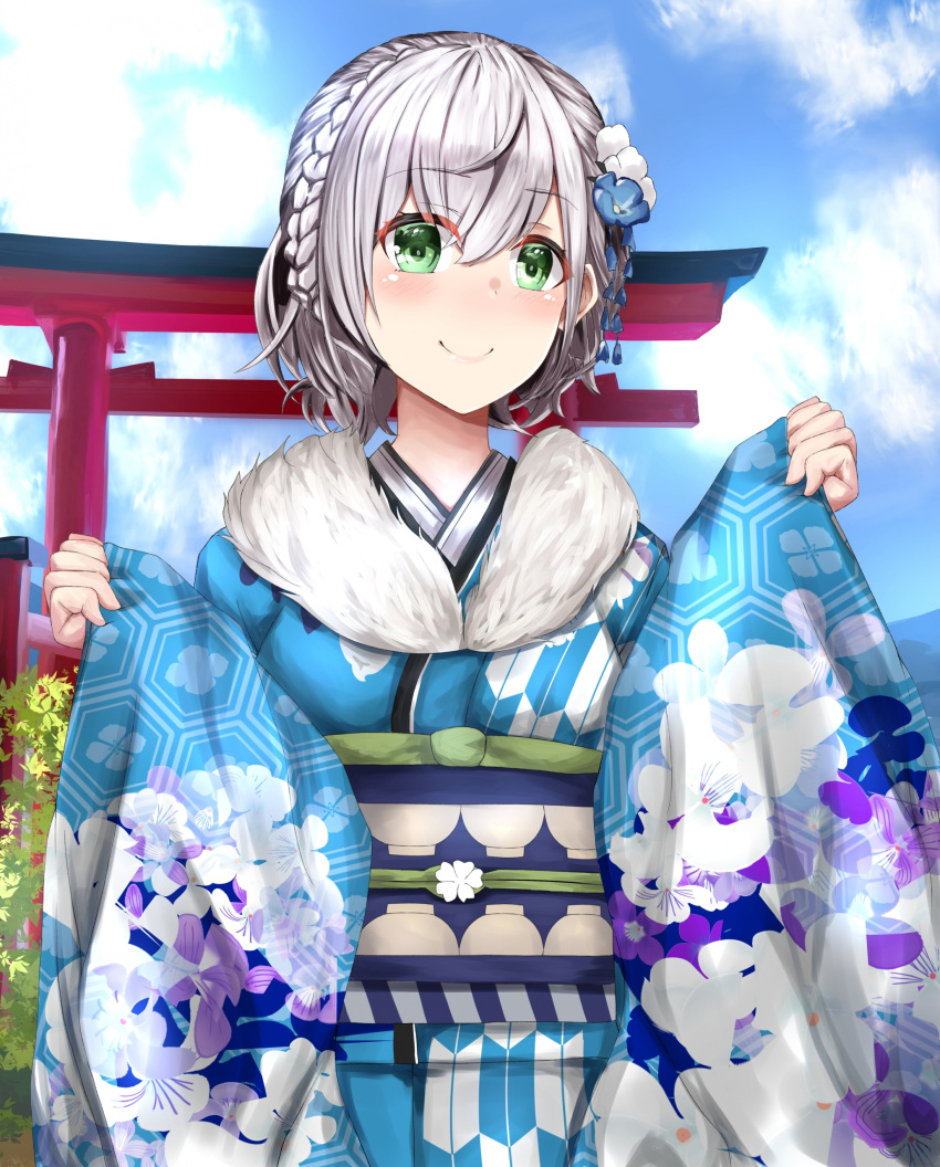 1girl absurdres alternate_costume alternate_hairstyle blue_sky braid closed_mouth clouds eyebrows_visible_through_hair green_eyes hair_between_eyes hair_ornament highres hololive japanese_clothes nakura_haru new_year outdoors shirogane_noel sky smile torii upper_body virtual_youtuber white_hair wide_sleeves