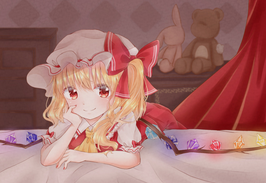 1girl arm_rest blonde_hair blush chest_of_drawers commentary_request curtains elbow_rest eyebrows_visible_through_hair fingernails flandre_scarlet hair_between_eyes hat hat_ribbon head_in_hand highres indoors looking_at_viewer lying mimi89819132 mob_cap nail_polish on_bed one_side_up partial_commentary puffy_short_sleeves puffy_sleeves red_nails red_skirt red_vest ribbon shirt short_hair short_sleeves skirt skirt_set smile solo stuffed_animal stuffed_bunny stuffed_toy teddy_bear touhou upper_body vest wallpaper_(object) white_headwear white_shirt wings
