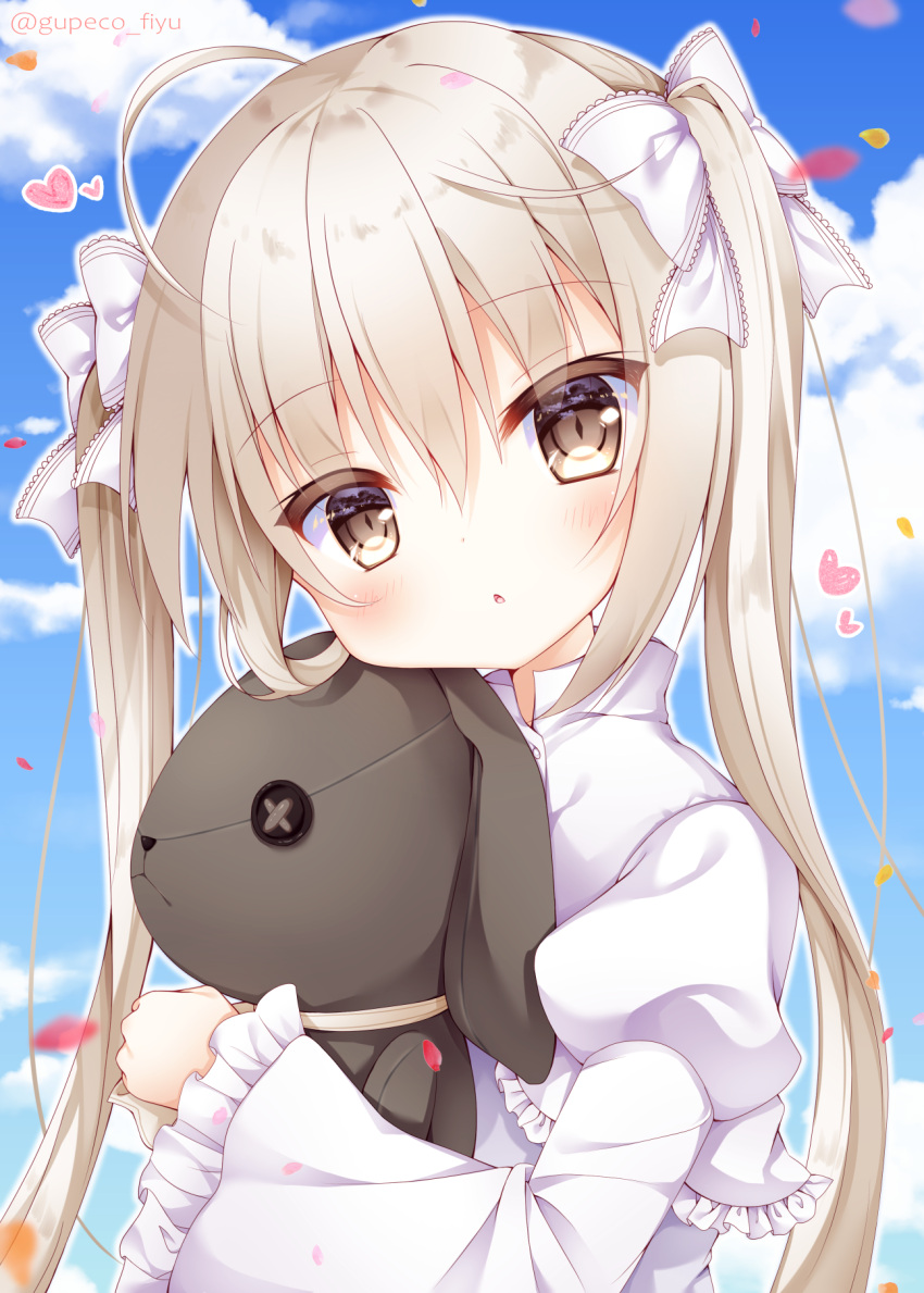 1girl ahoge blue_sky blush bow brown_eyes brown_hair clouds commentary_request day dress frilled_sleeves frills fuxiyu hair_bow head_tilt heart highres juliet_sleeves kasugano_sora long_hair long_sleeves looking_at_viewer object_hug outdoors parted_lips petals puffy_sleeves sky sleeves_past_wrists solo stuffed_animal stuffed_bunny stuffed_toy twintails twitter_username upper_body very_long_hair white_bow white_dress yosuga_no_sora