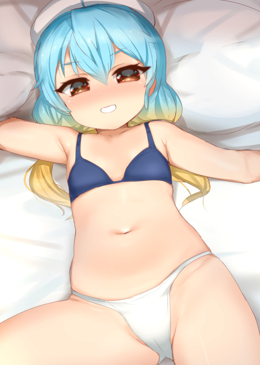 1girl bangs bare_arms bare_shoulders bed_sheet blonde_hair blue_bra blue_hair blush bra brown_eyes collarbone commentary_request cowboy_shot eyebrows_visible_through_hair gradient_hair grin groin hat highres kantai_collection kusaka_souji long_hair looking_at_viewer lying multicolored_hair navel on_back panties sado_(kantai_collection) sailor_hat skindentation smile solo stomach underwear underwear_only white_headwear white_panties