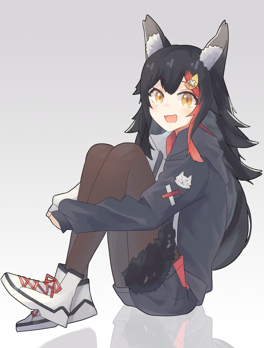 1girl :d animal_ears black_hair black_legwear full_body haojihaojigo highres hololive hood hood_down hoodie leg_hug long_hair long_sleeves ookami_mio open_mouth orange_eyes redhead shorts sitting sleeves_past_wrists smile tail virtual_youtuber wolf_ears wolf_tail