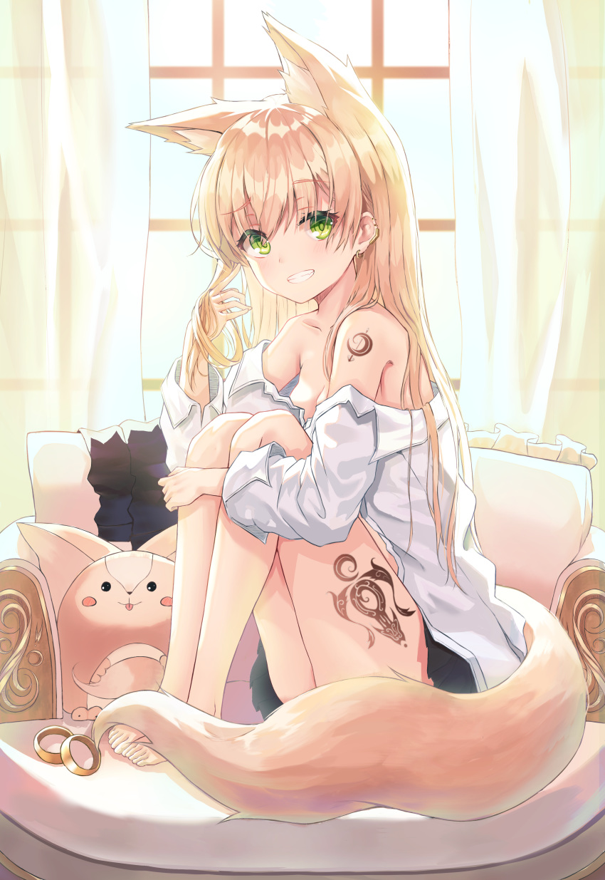 1girl absurdres animal_ears bare_shoulders barefoot black_skirt blonde_hair breasts curtains dress_shirt earrings extra_ears fox_ears fox_girl fox_tail green_eyes grin highres jewelry kano_(mgnnew12) knees_up long_hair looking_at_viewer medium_breasts miniskirt off_shoulder original pillow raised_eyebrow shirt shoulder_tattoo sitting skirt smile solo tail tattoo thighs white_shirt