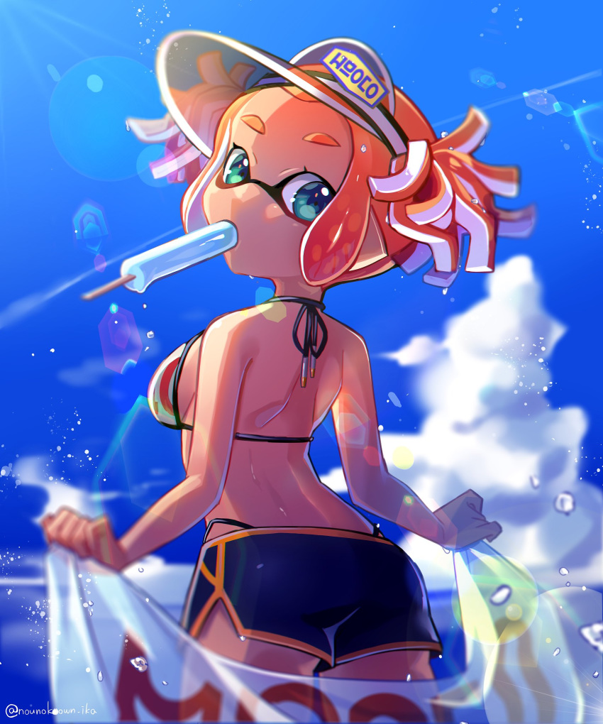 1girl back beach_towel bikini bikini_shorts black_shorts blue_sky blurry blurry_background breasts clouds cloudy_sky commentary cowboy_shot day depth_of_field domino_mask droplet food from_behind green_eyes highres holding holding_towel inkling inkling_(language) lens lens_flare logo looking_at_viewer looking_back mask medium_breasts mouth_hold nou orange_hair outdoors pointy_ears popsicle red_bikini see-through short_twintails shorts sky solo splatoon_(series) standing string_bikini sweatdrop swimsuit tentacle_hair towel twintails visor_cap